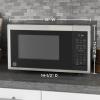 imageGE GCST09N1WWW Microwave Oven 900watt 7 Auto Cooking Settings ChildLock Technology Kitchen Essentials for The Countertop Dorm Room or Apartment 09 Cu Ft WhiteStainless Steel