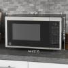 imageGE GCST09N1WWW Microwave Oven 900watt 7 Auto Cooking Settings ChildLock Technology Kitchen Essentials for The Countertop Dorm Room or Apartment 09 Cu Ft WhiteBlack