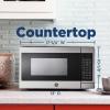 imageGE GCHK07N1WBB Microwave Oven 700watt 6 Auto Cooking Settings ChildLock Technology Kitchen Essentials for The Countertop Dorm Room or Apartment 07 Cu Ft BlackStainless Steel